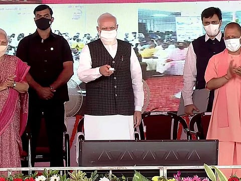 Indian Prime Minister Narendra Modi inaugurates nine medical colleges in Uttar Pradesh, in Siddharthnagar, Monday, Oct. 25, 2021. UP Governor Anandiben Patel and Chief Minister Yogi Adityanath also seen.