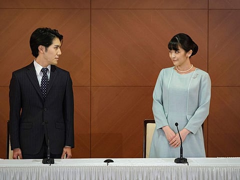 Princess Mako, the elder daughter of Prince Akishino and Princess Kiko, and her husband Kei Komuro, a university friend of Princess Mako, during a press conference to announce their wedding at Grand Arc Hotel in Tokyo, Japan on October 26, 2021.