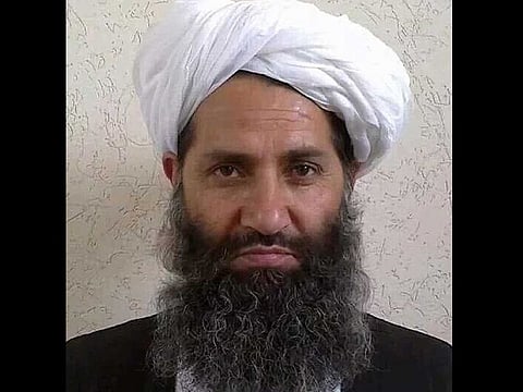 This undated file photo handout released by the Afghan Taliban on May 25, 2016 shows Taliban supreme leader Mullah Haibatullah Akhundzada posing for a photograph at an undisclosed location. Haibatullah Akhundzada has made his first-ever public appearance, officials announced on October 31, 2021, addressing a meeting of supporters in southern city Kandahar. 