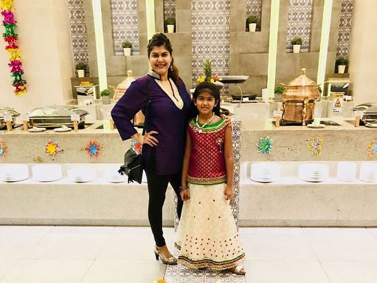 Alison Rego with her daughter