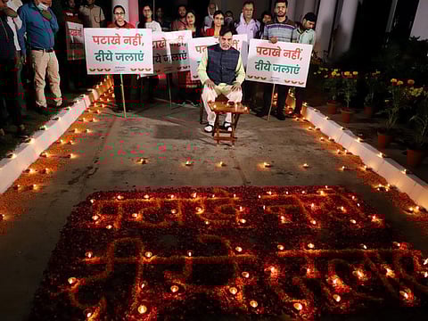 Delhi Minister for Environment Gopal Rai launches the ‘Patake Nahi, Diya Jalao’ [Light up lamps, not crackers] campaign to motivate people to embrace tradition and eliminate pollution, in New Delhi.