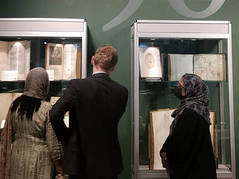 Sharjah book Fair visitors browse through some rare collections at the Peter Harrington stall on Tuesday.