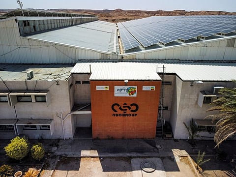 An aerial view shows the logo of Israeli cyber firm NSO Group at one of its branches in the Arava Desert, southern Israel July 22, 2021. 