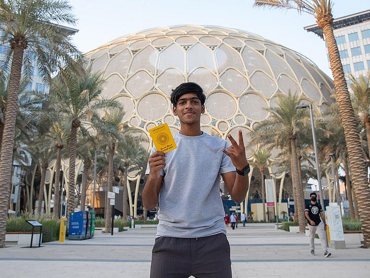 Fazil-Ummer-with-his-Expo-passport-that-has-stamps-from-visiting-every-Expo-pavilion-in-three-days_Large-Image_m8138-1636038001911