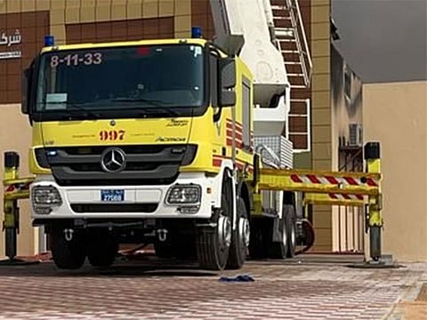 Firefighters at the scene of the fire.