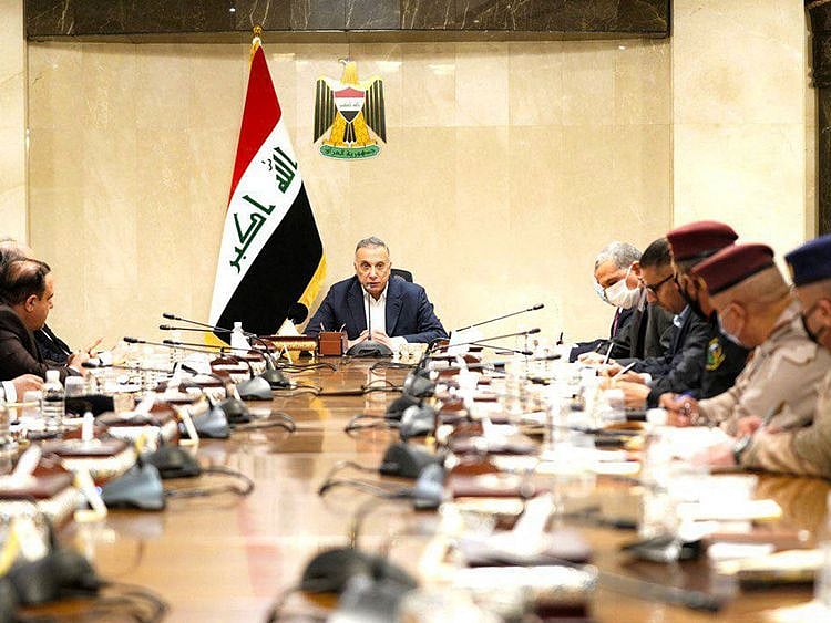  A handout picture released by Iraq's Prime Minister's Media Office on November 7 shows Iraqi Prime Minister Mustafa Al Kadhimi heading a meeting, hours after his residence was targeted by a drone attack, in the capital Baghdad. 