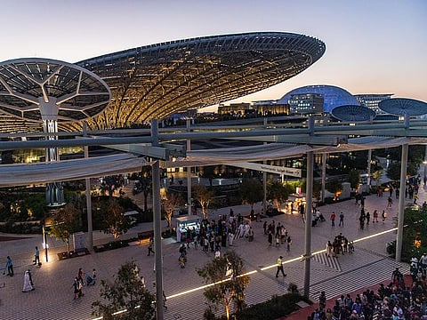 Visitors at Expo 2020 Dubai in front of the Sustainability Pavilion 