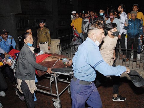 A patient being moved to a safe ward after a fire erupted in the Paediatric Intensive Care Unit at Government Kamal Nehru hospital in Bhopal, on November 8, 2021. Four infants died in the incident. (PTI Photo)(PTI11_09_2021_000014B)