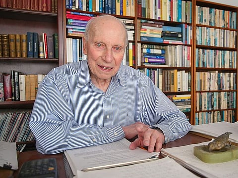 Manfred Steiner, who earned his Ph.D. in physics from Brown University at the age of 89, is photographed in his home office.