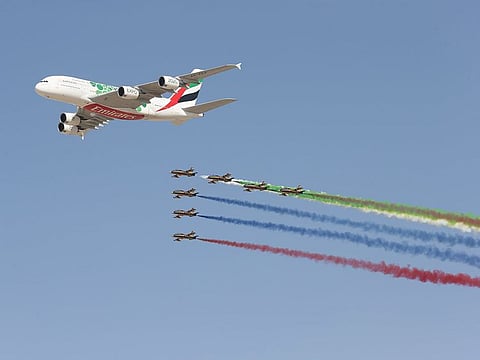 An Emirates A380 and the Al Fursan aerobatic team at the 2019 airshow in Dubai.
