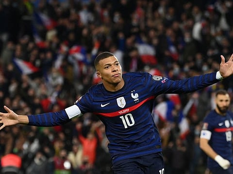 France's forward Kylian Mbappe celebrates after scoring a goal during the FIFA World Cup 2022 qualification match against Kazakhstan at the Parc des Princes stadium in Paris. France won 8-0.