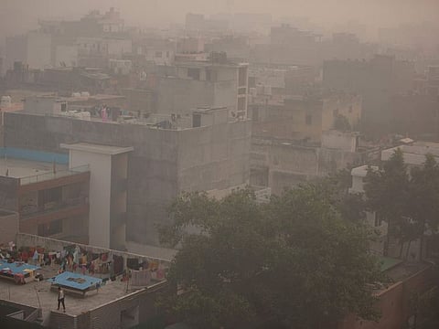 Morning haze and smog envelops the skyline in New Delhi, India, Friday, Nov. 5, 2021. New Delhi's pollution crisis worsened on Sunday as air quality hit dangerous levels, a problem that rears its head every winter.