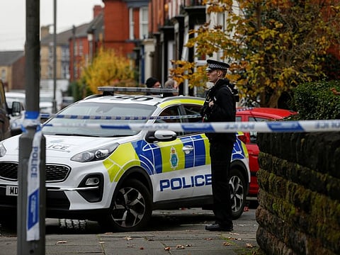 A police officer stands guard, following the car blast of Liverpool Women's Hospital, in Liverpool, on November 15, 2021. 