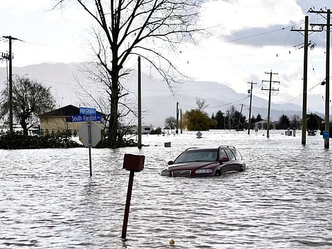 South Parallel road is submerged in flood water after rainstorms caused flooding and landslides in Abbotsford, British Columbia, on November 16, 2021.  