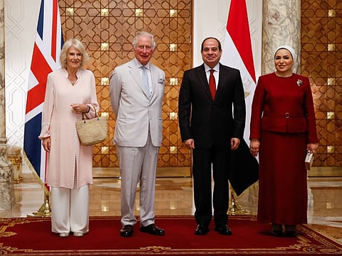 Britain's Prince Charles, Prince of Wales, and Camilla, Duchess of Cornwall, are welcomed by Egypt's President Abdul Fattah Al Sissi and his wife Entissar Amer, at the presidential palace, in Cairo, on November 18, 2021. 