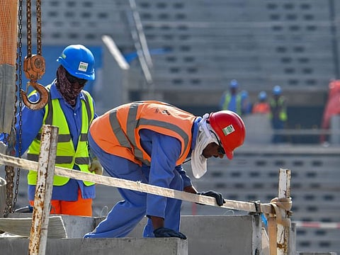 Construction workers at Qatar's Lusail Stadium,  one of the Qatar's 2022 World Cup stadiums, around 20km north of the capital Doha in a file photo.