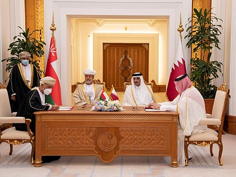 Qatar's Emir Sheikh Tamim bin Hamad Al Thani and Oman's Sultan Haitham bin Tariq witness the signing of agreements between the two countries in Doha, Qatar November 22, 2021.