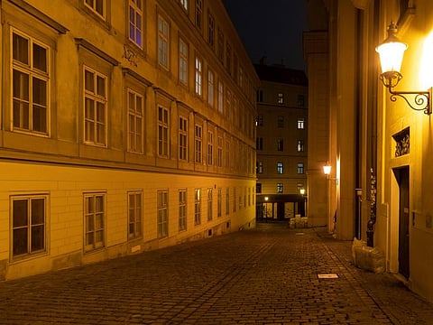 Empty streets on the evening before the beginning of a nationwide lockdown due to the fast rising COVID-19 infections in the country in Vienna, on November 21, 2021. 