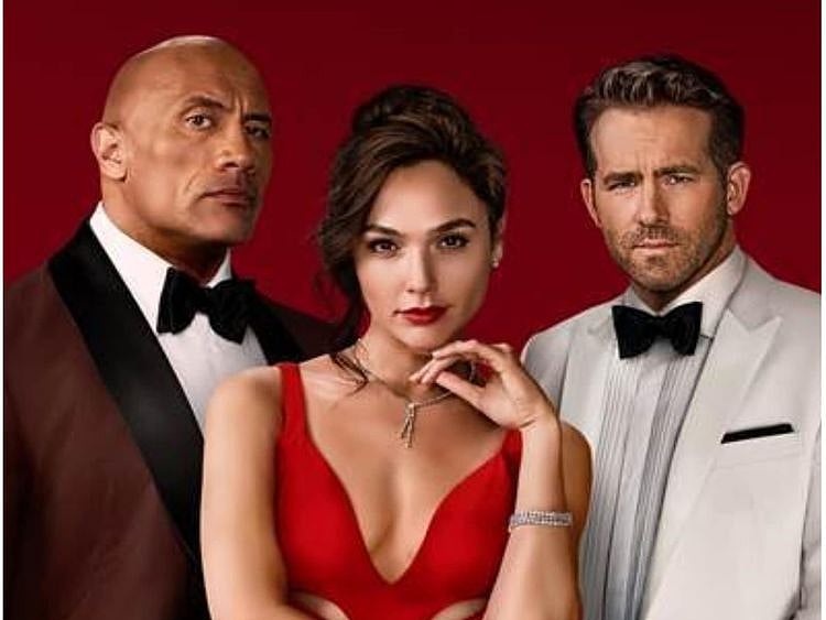Dwayne Johnson, Gal Gadot and Ryan Reynolds in Red Notice