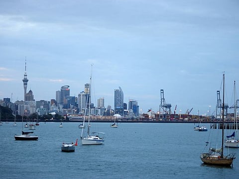 The Sky Tower and buildings in Auckland, New Zealand. New Zealand closed its borders in March last year, requiring all international arrivals to undergo two weeks of hotel quarantine, a period that was recently cut to seven days.