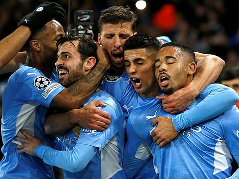 Manchester City's Gabriel Jesus celebrates scoring their second goal with teammates.