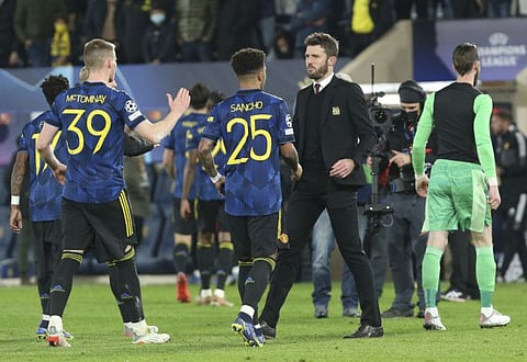Manchester United's caretaker manager Michael Carrick (third left) shakes hands with Jadon Sancho and Scott McTominay at the end of their Group F Champions League match against Villarrealat the Ceramica stadium in Villarreal, Spain. Carrick's next match in temporary charge will be against Chelsea on Sunday.