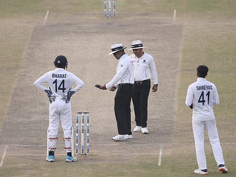 Umpires check light during play on Day-5 of the 1st Test match between India and New Zealand, at Green Park International Stadium, in Kanpur.