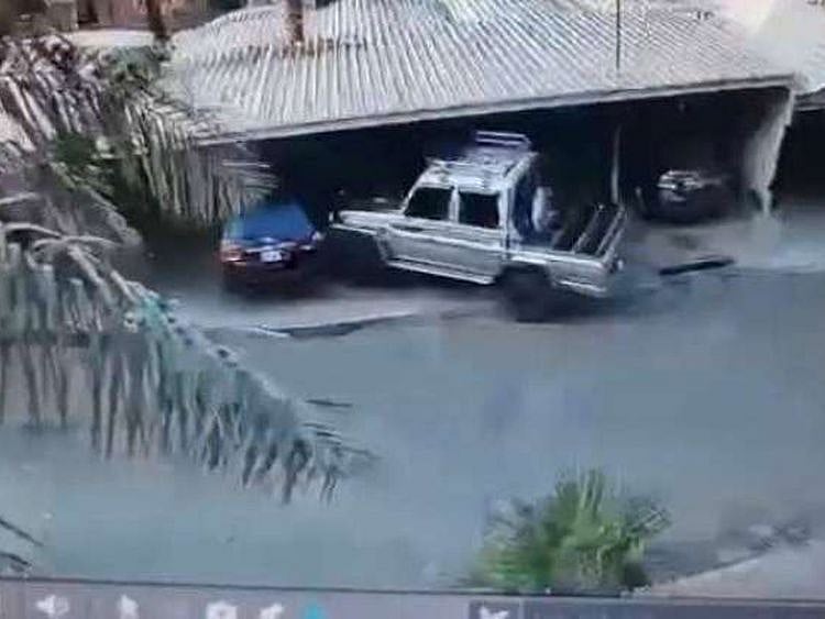 A garb taken from a CCTV camera purportedly showing the man drives into neighbours' cars. 