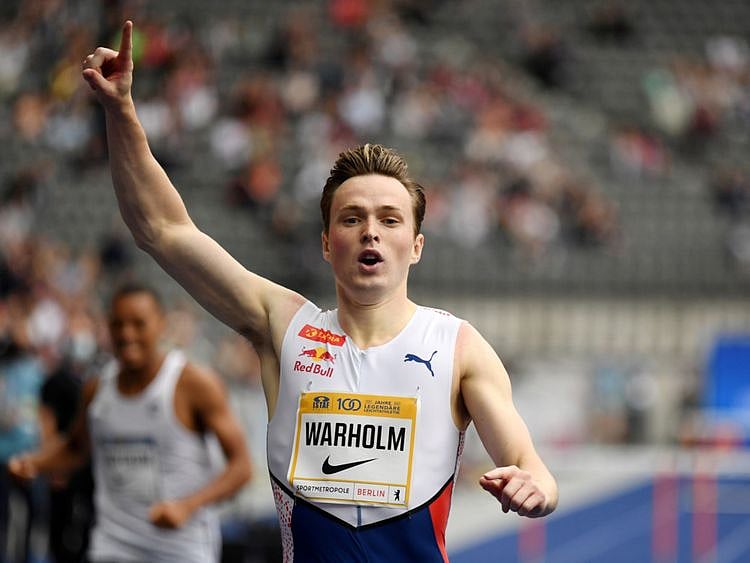 Copy of 2021-12-01T203804Z_251077721_RC2W5R918DTM_RTRMADP_3_ATHLETICS-AWARDS-WARHOLM-1638430102375