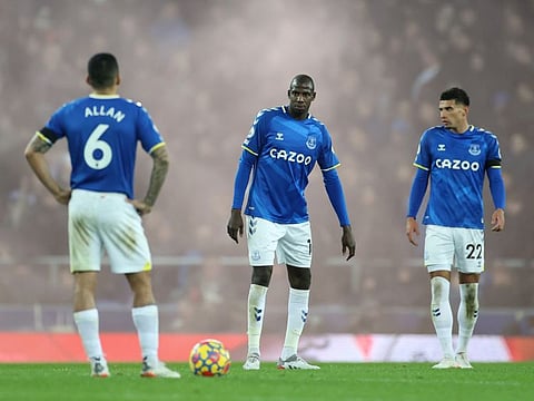 Everton's Allan, Abdoulaye Doucoure and Ben Godfrey look dejected at the full time whistle following the 4-1 defeat in the derby at Goodison Park against Liverpool.