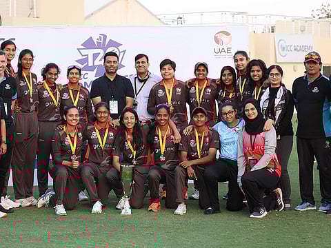 UAE women's cricket team poses with their coach, support staff and senior officials of Emirates Cricket Board on Thursday.