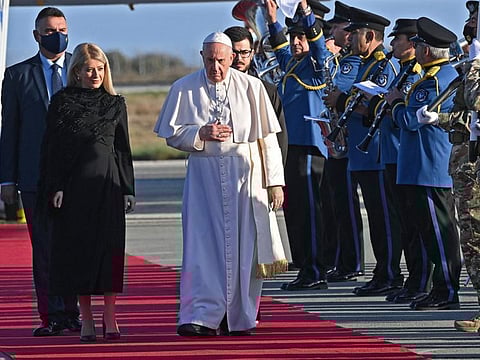 Pope Francis arrives in the southern Cypriot port city of Larnaca on December 2, 2021 at the start of a landmark trip to push two of his priorities: the plight of migrants and inter-confessional dialogue.