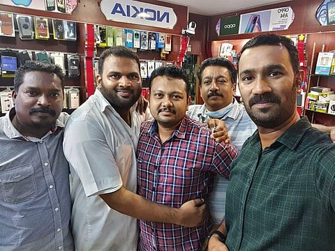 Renjith Venugopalan, centre, and his friends who won DH10 million in Big Ticket draw. 