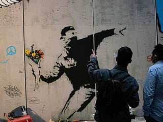 Photos: Milan train station hosts 'World of Banksy'