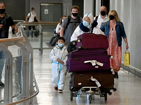 International arrive at Melbourne's Tullamarine Airport on November 29, 2021 as Australia records it's first cases of the Omicron variant. 