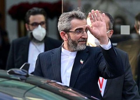 Iran's chief nuclear negotiator Ali Bagheri Kani leaves the Coburg Palais, venue of the Joint Comprehensive Plan of Action (JCPOA) meeting aimed at reviving the Iran nuclear deal, in Vienna on December 3, 2021. 