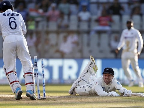New Zealand's Tom Blundell run out by India's Srikar Bharat on the third day of the 2nd Test match between India and New Zealand, at Wankhede Stadium, in Mumbai.