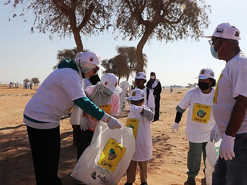 Volunteers at work during the 'Clean Up UAE' programme. 