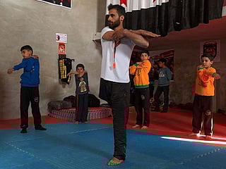 Photos: North Syria's one-legged kung fu master