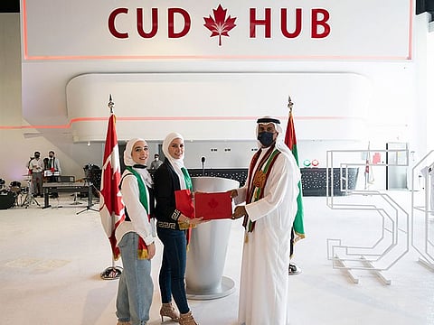 Buti Saeed Al Ghandi, Chancellor Canadian University Dubai, with  students