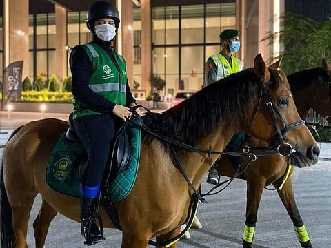 A volunteer of Dubai Police's mounted unit. 