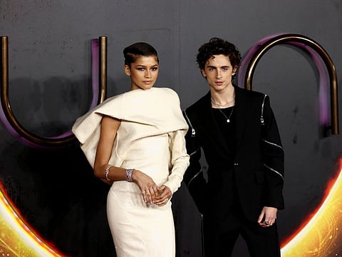 Cast members Zendaya and Timothee Chalamet pose as they arrive for a UK screening of the film "Dune" in London, Britain October 18, 2021.