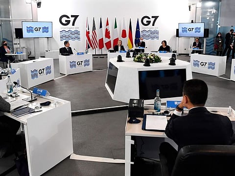 Britain's Foreign Secretary Liz Truss, centre, chairs the G7 summit of foreign and development ministers at the Museum of Liverpool, England, on Saturday.