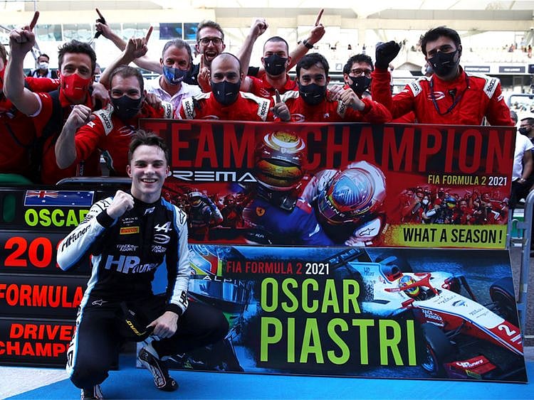 Oscar Piastri celebrates the Formula Two World Championship at Yas Marina Circuit 