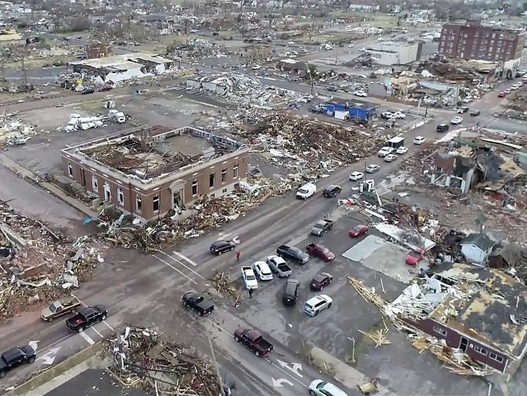 An aerial view of damage after a tornado tore through, in Mayfield, Kentucky, on December 11, 2021, in this still image taken from a video.  