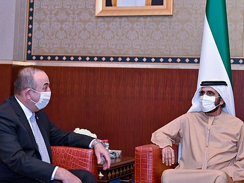 Sheikh Mohammed bin Rashid Al Maktoum (right) holding talks with Turkish Foreign Minister Mevlut Cavusoglu in Dubai on Wednesday