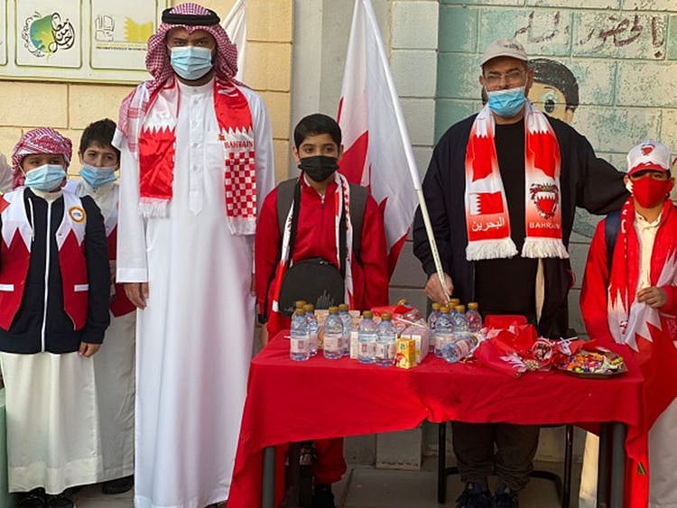 Schoolchildren celebrate the National Day in Manama on Thursday.