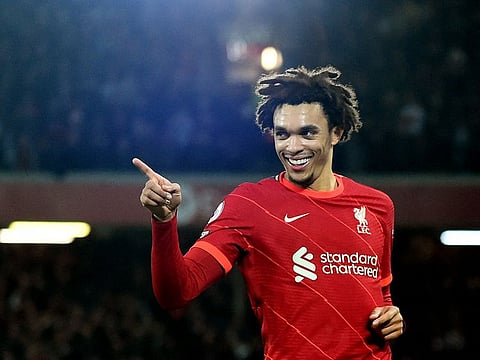 Liverpool's Trent Alexander-Arnold celebrates scoring their third goal.