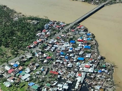 Aerial photo shows damaged houses caused by Typhoon Rai in Siargao island, Surigao del Norte province, southern Philippines on Friday. 