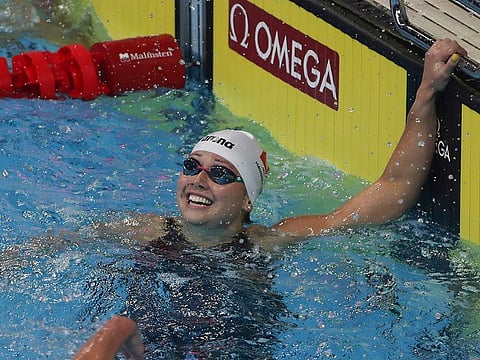 Siobhan Haughey of Hong Kong reacts after her world record in the women's 200m Freestyle Final on Day One of the FINA World Swimming Championships (25m) in Abu Dhabi on Thursday night.